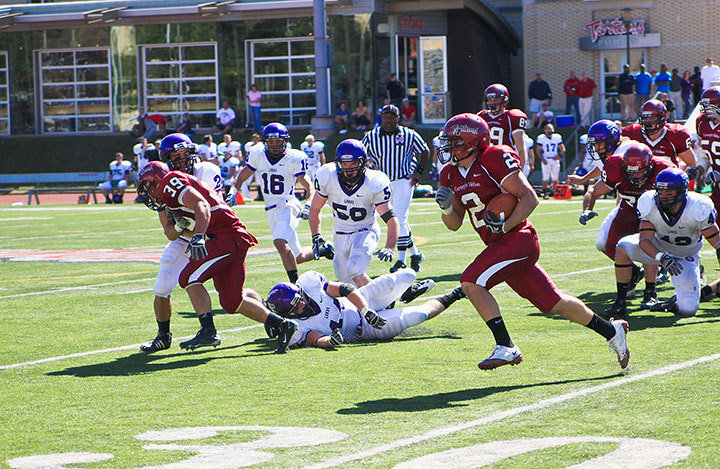 Coming off a 4–6 season, the Carnegie Mellon football team will begin its fall schedule on Sept. 3. Fullback Chris Garcia (No. 2), returning to the team as a senior, carried the ball for 296 yards rushing last year. (credit: File Photo)