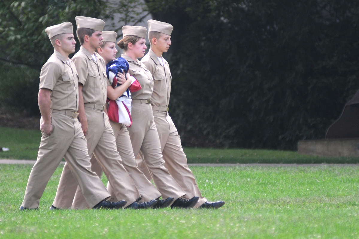 Members of the Naval Reserve Officers Training Corps participate in a “retiring of colors” ceremony to honor the victims of the Sept. 11 attacks on the Cut during Sunday’s ceremony. (credit: Thomas Hofman/Photo Editor)