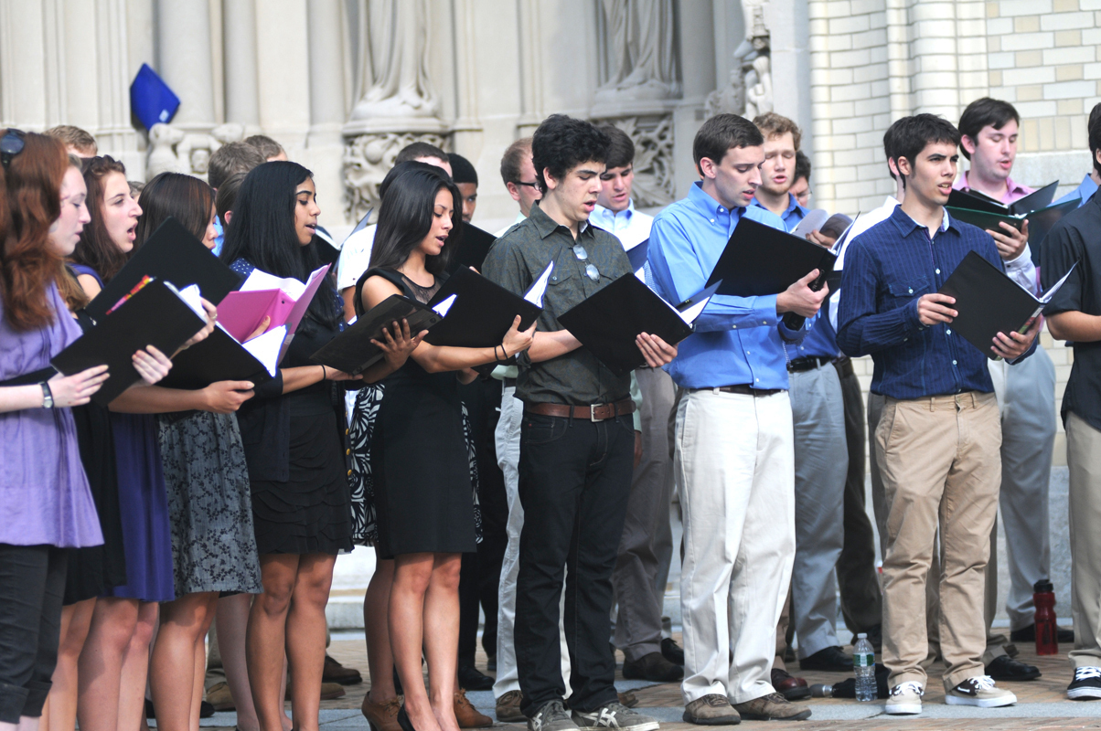 The Carnegie Mellon choir, directed by Robert Page, sang a selection of solemn and patriotic songs following Cohon’s speech at the ceremony on Sunday. (credit: Thomas Hofman/Photo Editor)