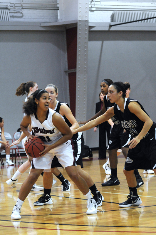 First-year guard Gabrielle West, number 21, is averaging 12.6 points per game, the second-highest for the Tartans this season. (credit: Tommy Hofman/)