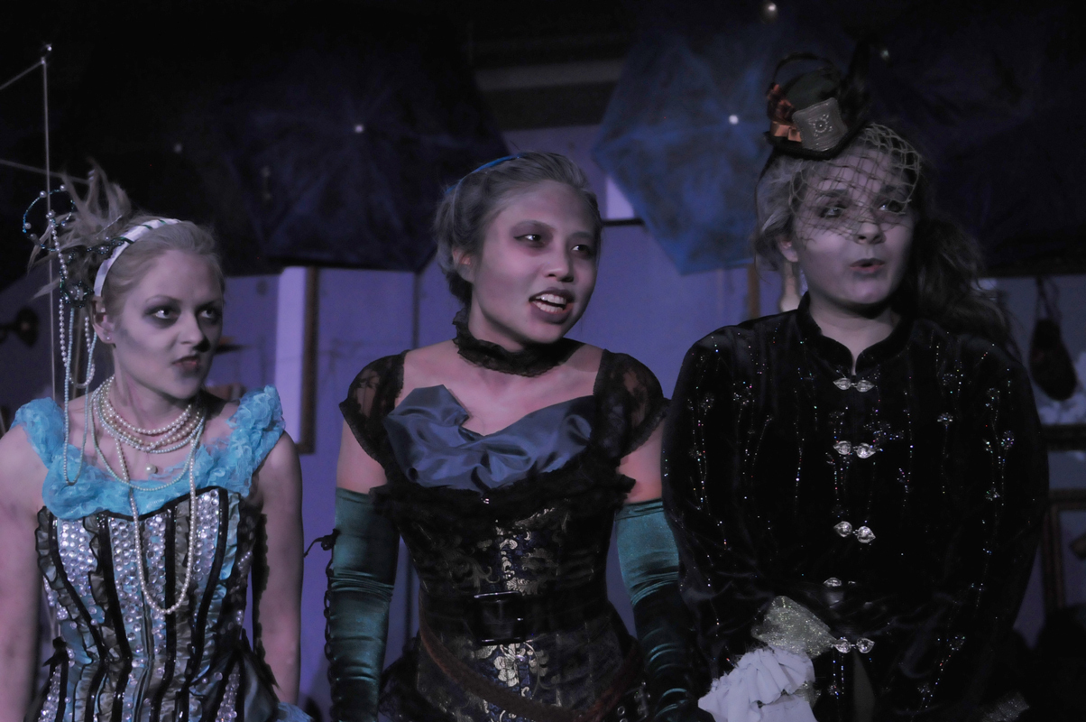 The Stones (played by sophomore Larissa Jantonio, junior Erika Tang, and fourth-year Christine de Carteret, in order of appearance) served as an Underworld version of a Greek chorus. (credit: Courtesy of Guillermo Gomez)