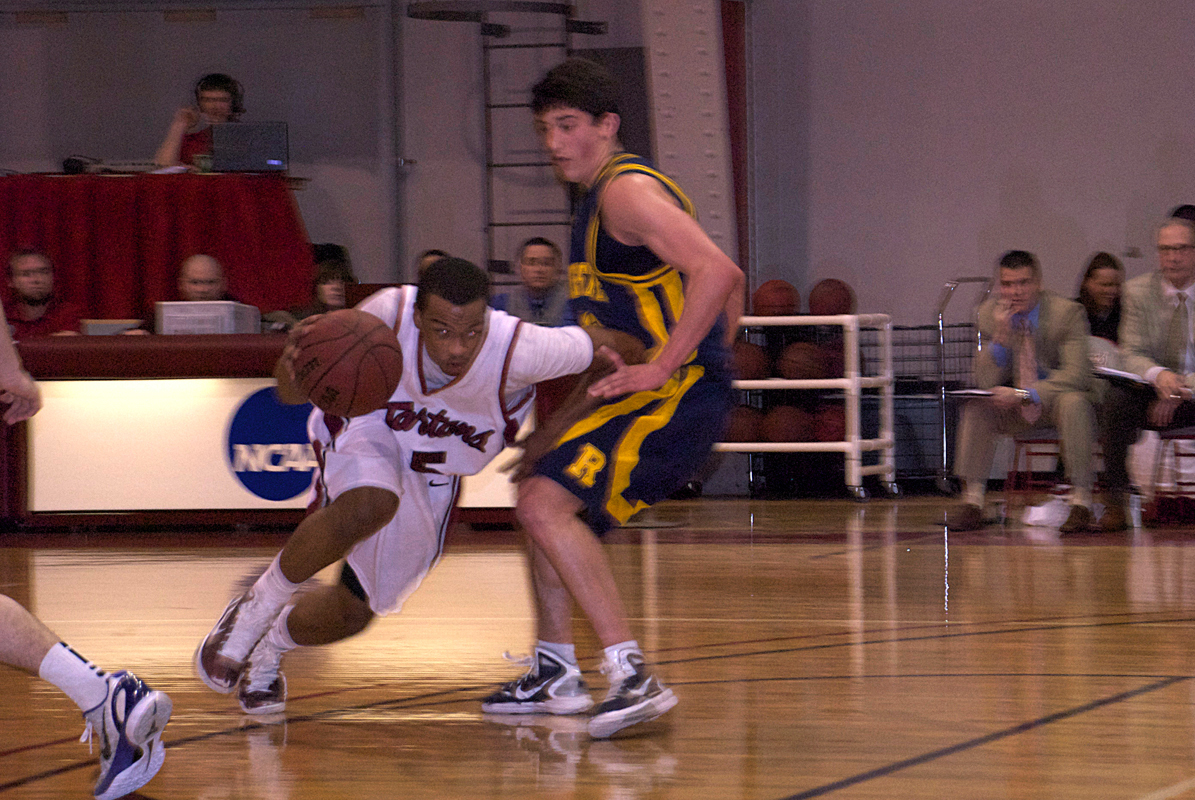 Junior guard Rashaun Riley (No. 5) scored 11 points against the College of Wooster. (credit: File Photo)