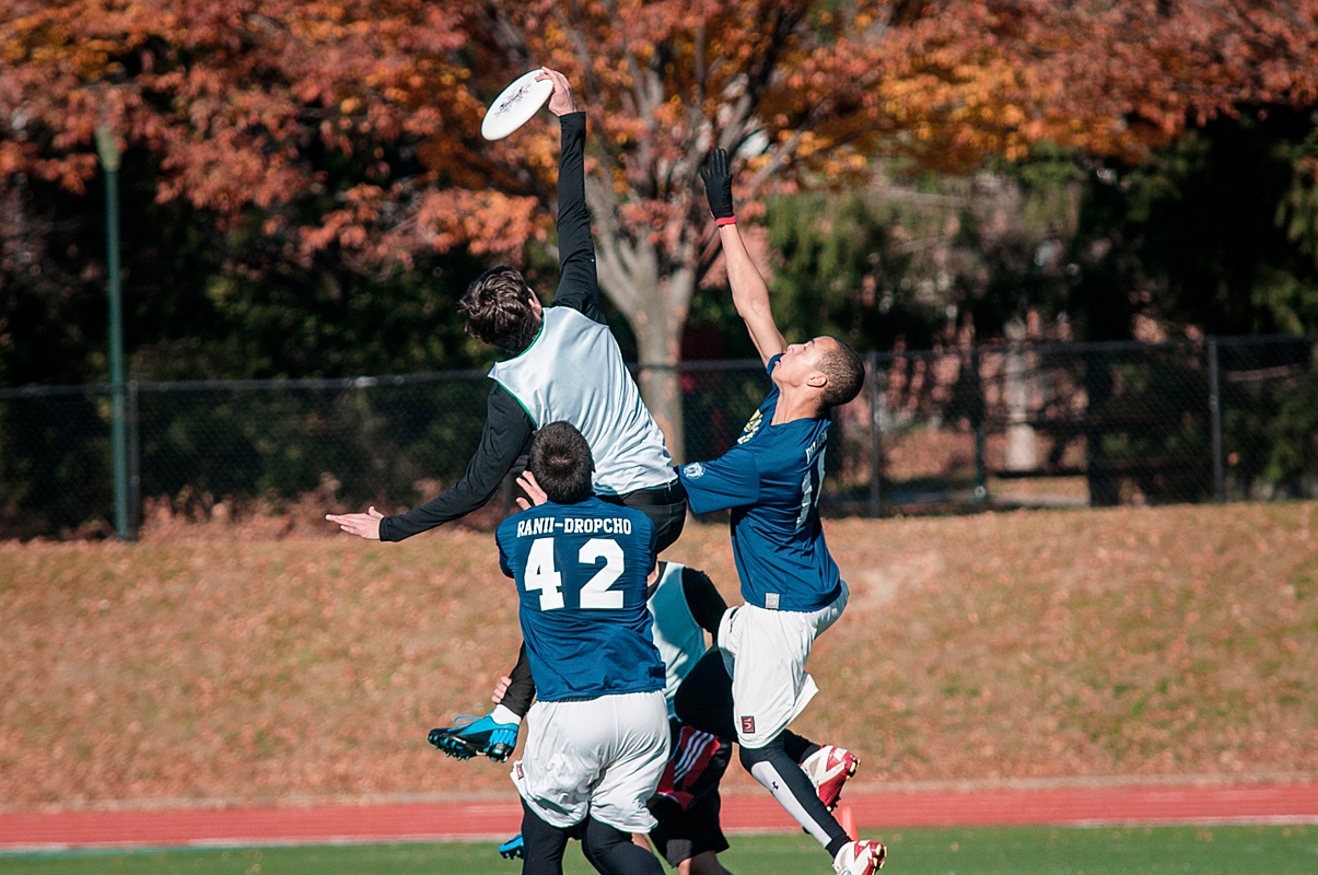 First-year Ross Ellison skies over two University of Pittsburgh players. (credit: Courtesy of Jeremy Kanter)