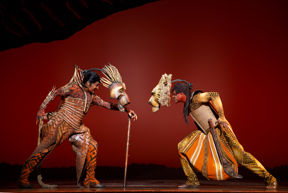 Scar (left, played by Patrick R. Brown) and Mufasa (right, L. Steven Taylor) face off in the Broadway Across America production of The Lion King. (credit: Courtesy of Joan Marcus)