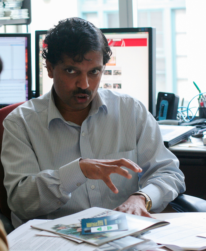 Ragunathan Rajkumar, the director of Carnegie Mellon’s Technologies for Safe and Efficient Transportation, discusses his work on vehicle sensors that can detect other cars, pedestrians, and even red lights. (credit: Michelle Wan/Junior Photographer)