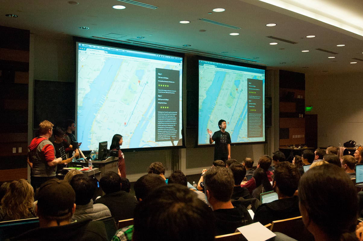The team Tourgeni.us presents their trip planner project. (credit: Josh Smith)