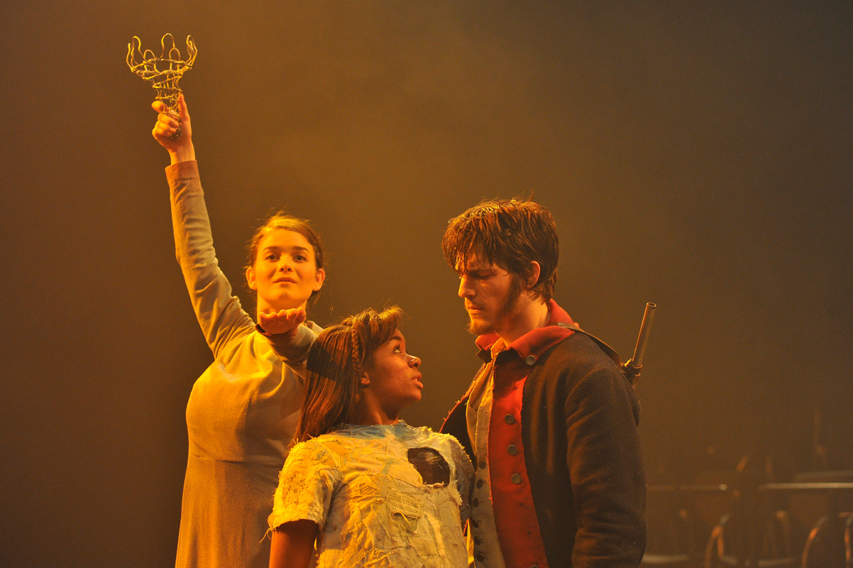 In _The Last Page: A Nuclear Folktale_, Soldier (David Patterson) befriends Little Girl (Alexis Floyd) and the pair go searching for the crown of Statue (Olivia Brown). (credit: Courtesy of Louis Stein)