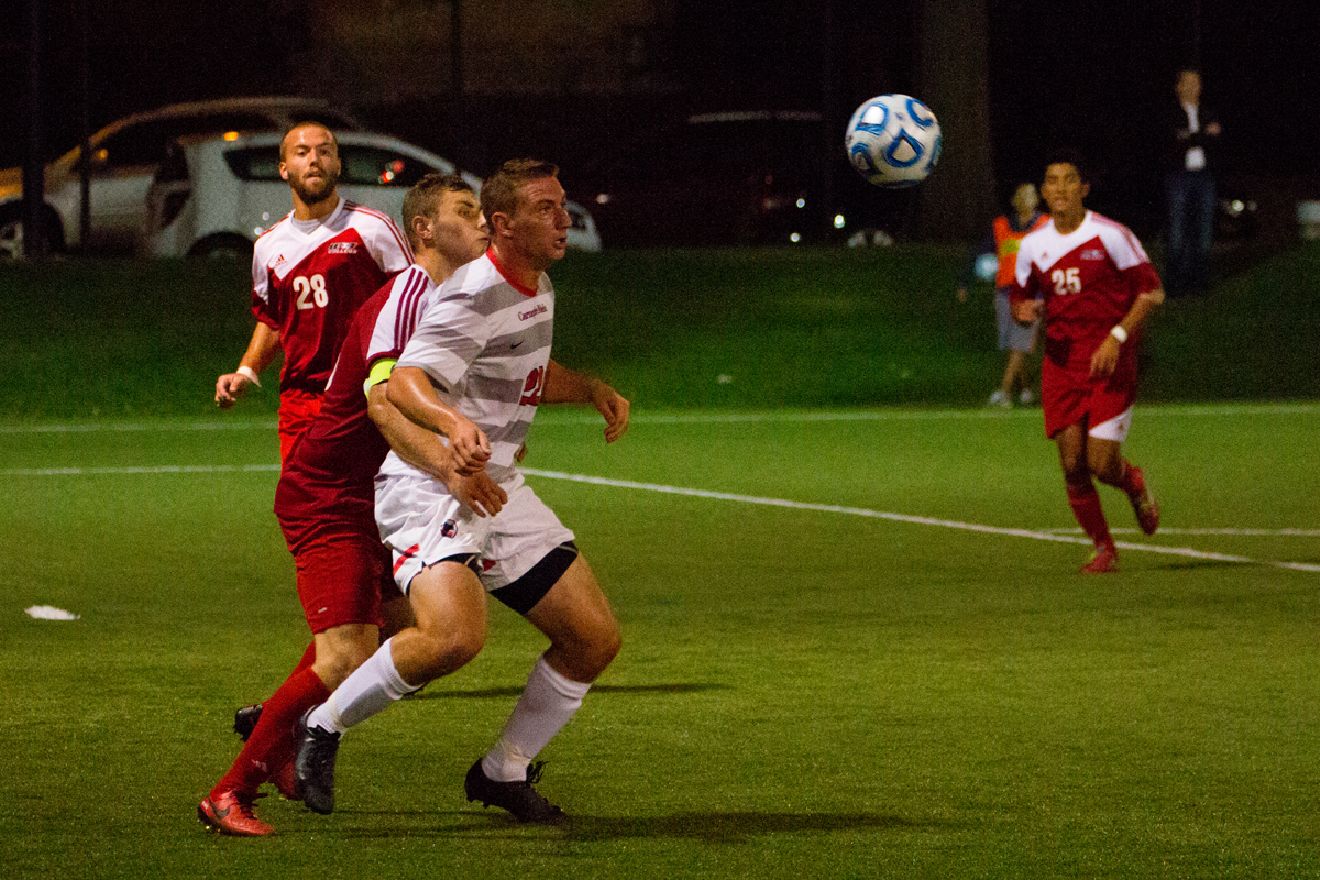 Junior Forward Ben Alderoty positions himself to gain possession of the ball. (credit: Staff Photographer)