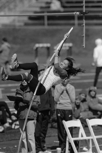 Grace Yee launches herself away from the ground in a pole vaulting event in the 2015 season. (credit: CMU Athletics)