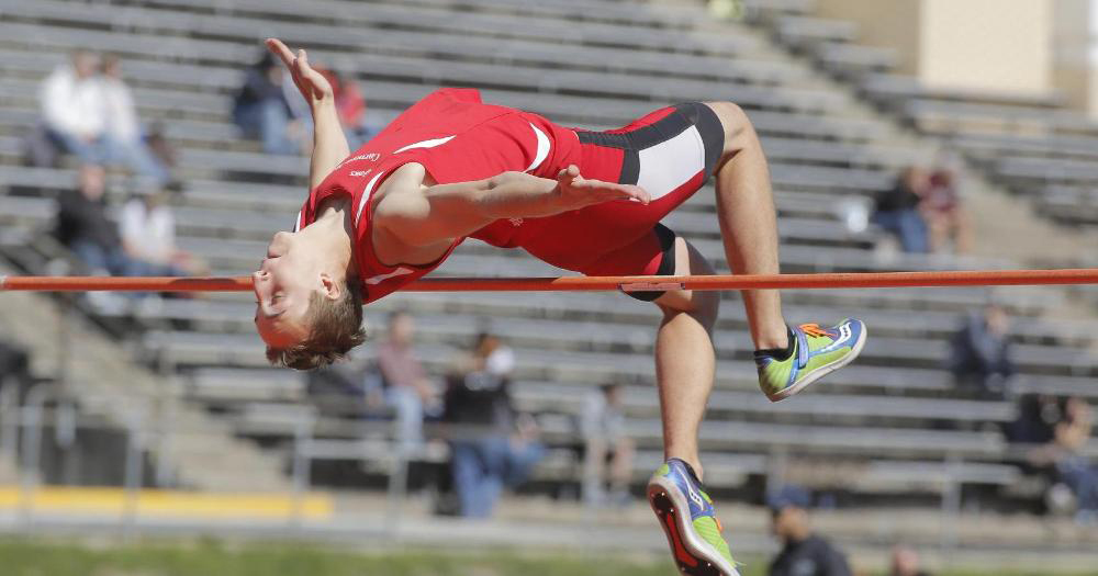 First-year jumper Reed Farber leaps into the air during the high jump event at the Carnegie Mellon Quad Meet. (credit: Courtesy of CMU Athletics)
