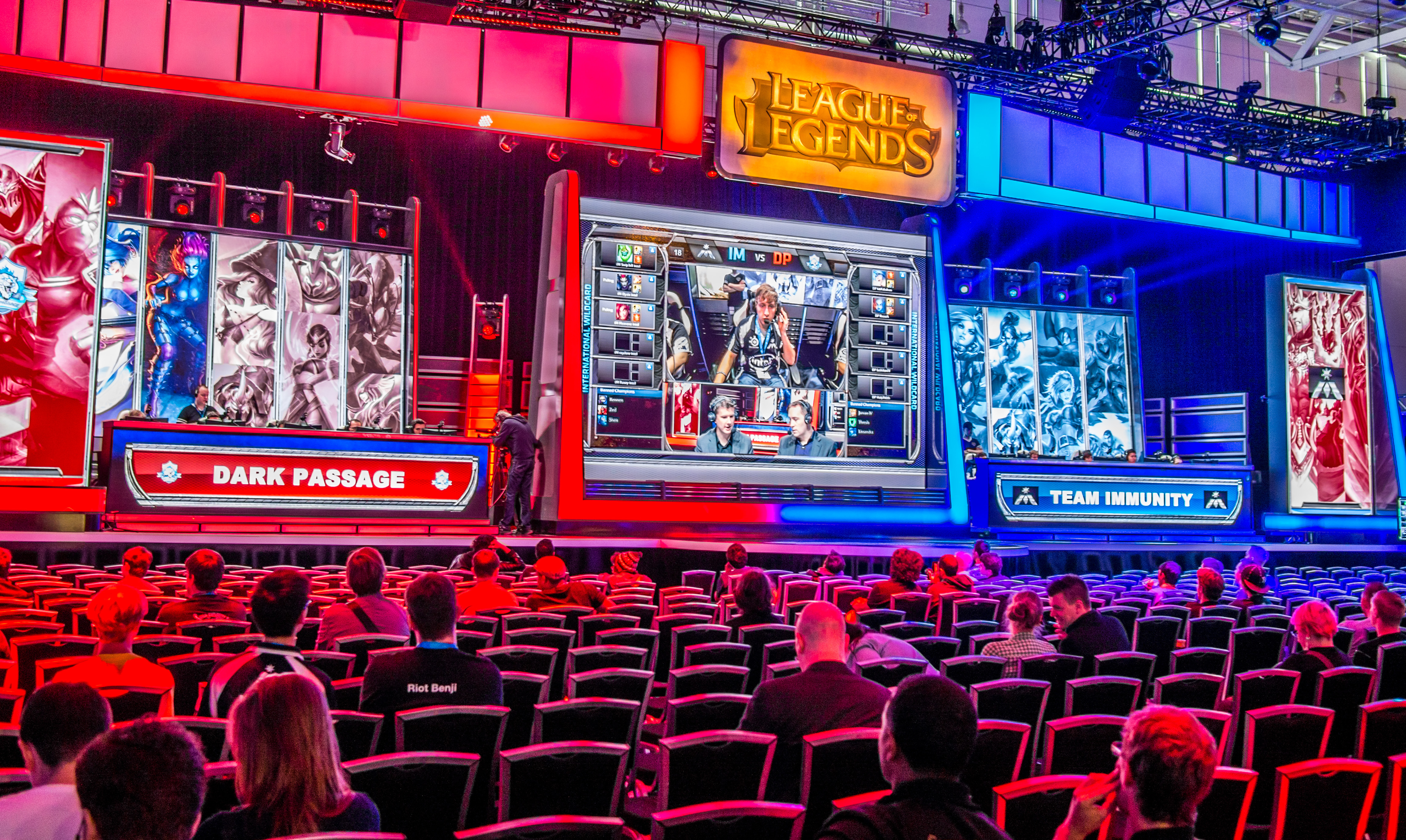 Players at a League of Legends event prepare for a match on the stage. (credit: Courtesy of Sergey Galyonkin via Flickr Creative Commons)