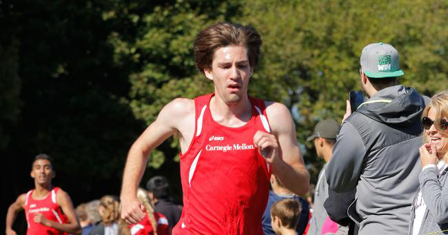 Junior Ryan Auld crosses the finish line at the Saint Vincent College Invitational, where he finished 13th place. (credit: Courtesy of CMU Athletics)