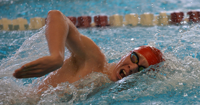 A Carnegie Mellon swimmer slices his way through the water at the Kenyon College Invitational this weekend. (credit: Courtesy of CMU Athletics)