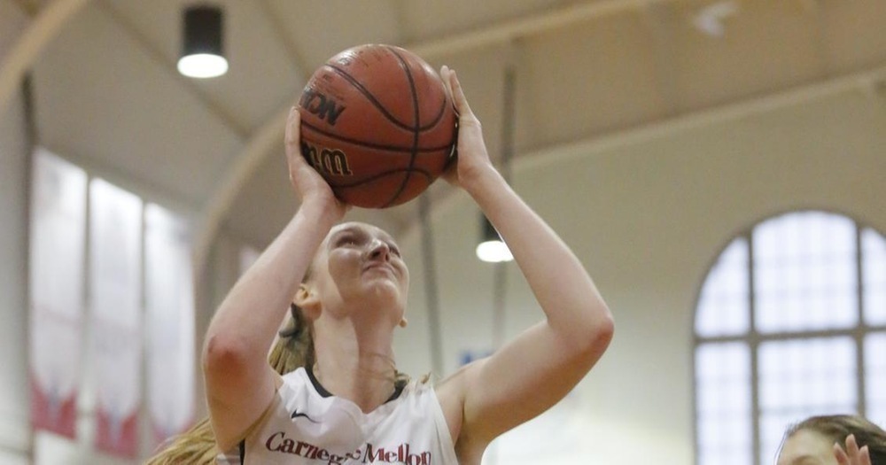Senior center and forward Lisa Murphy prepares a shot in a record breaking day for offensive rebounds. (credit: CMU Athletics)