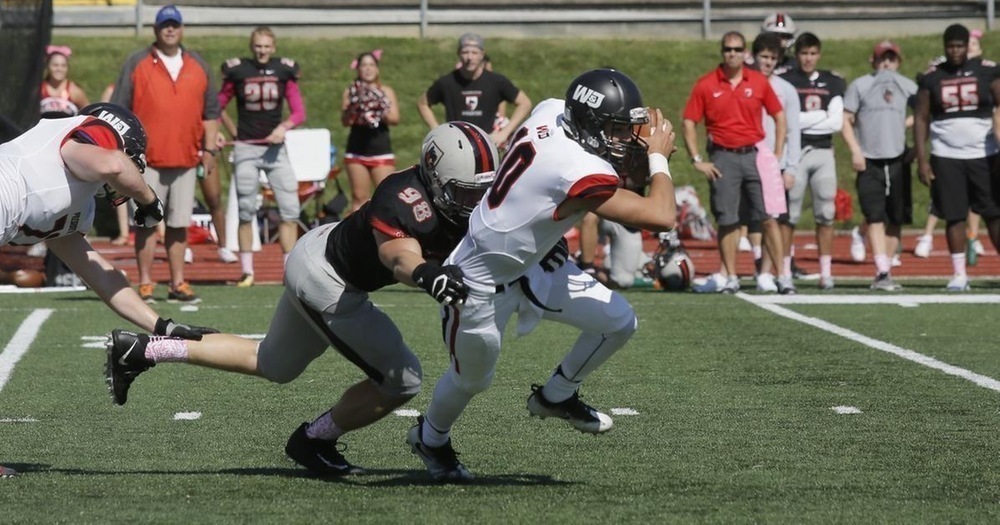 Sophomore defensive end Michael Lohmeier sacks a quarterback. (credit: Courtesy of CMU Athletics)