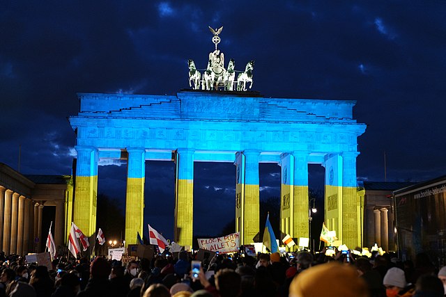 Russia’s invasion sparked international responses. The Brandenburg Gate was lit with the colors of the Ukrainian flag. (credit: Courtesy of Leonhard Lenz via Wikimedia Commons)